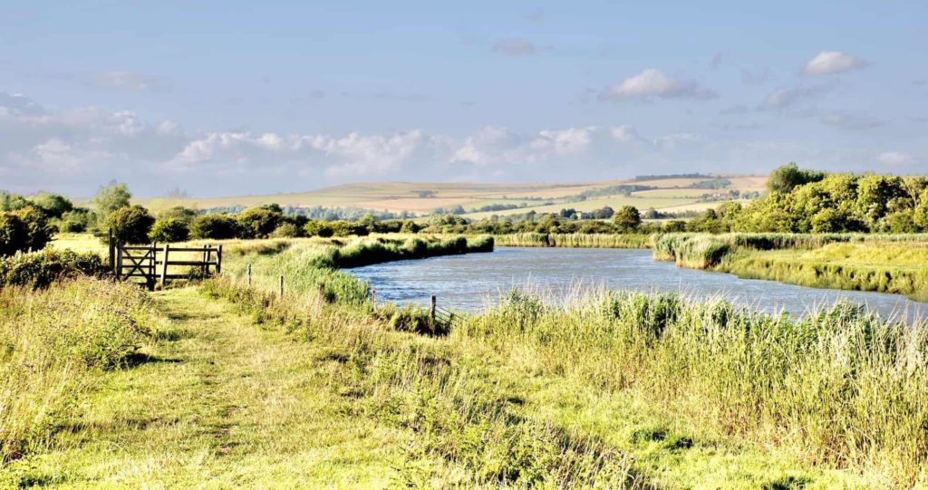 countryside walk along river bank