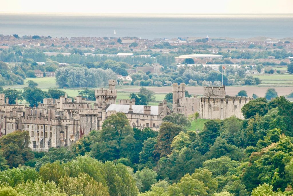 arundel castle with view of arundel to coast